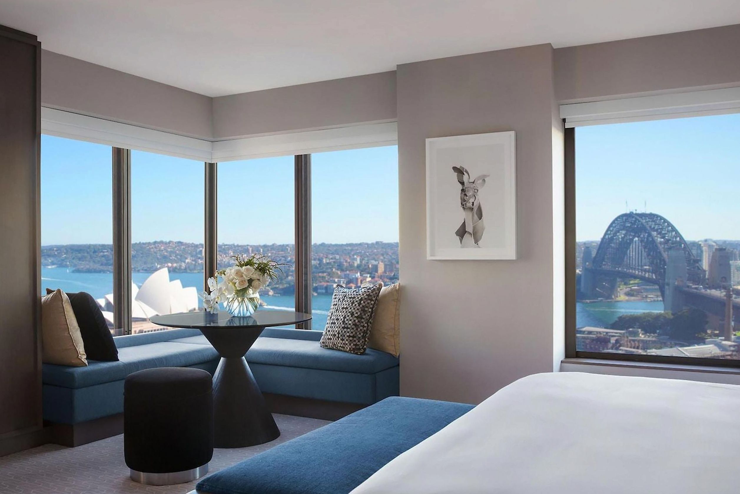 Deluxe hotel room with elegant decor and warm ambient lighting