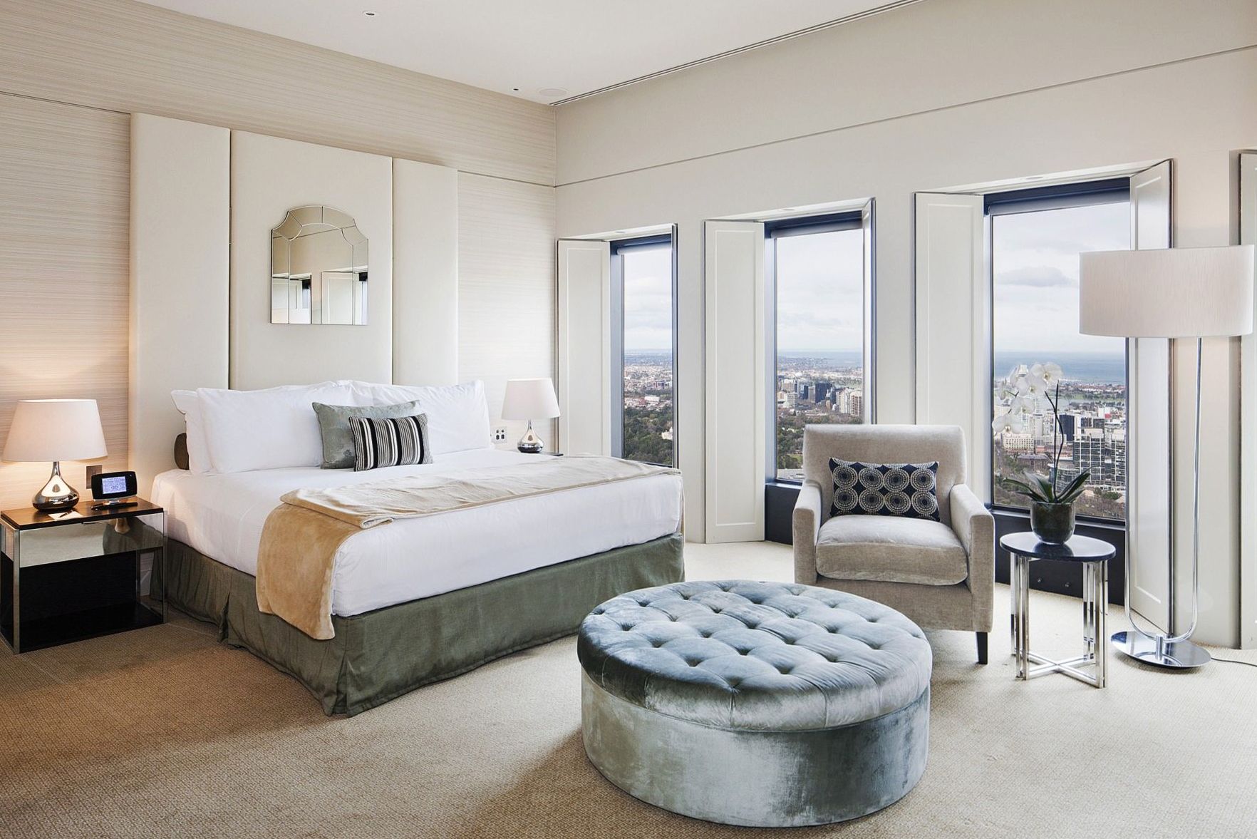 Luxury suite interior with premium furnishings and harbour view